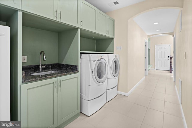 5 Klockner Ct, Lawrence Township, NJ 08648 - washroom with separate washer and dryer, baseboards, visible vents, arched walkways, and a sink