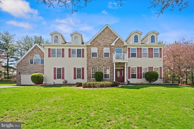 5 Klockner Ct, Lawrence Township, NJ 08648 - view of front of house featuring a garage, a front yard, driveway, and a balcony