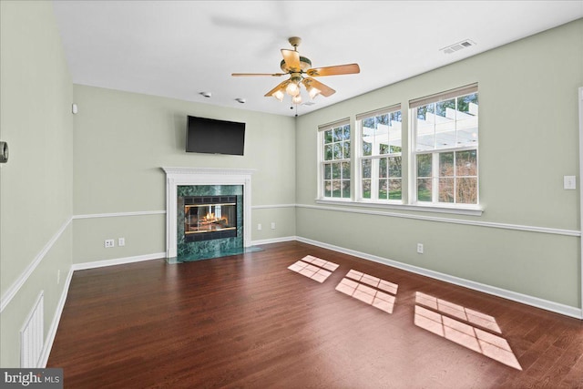 5 Klockner Ct, Lawrence Township, NJ 08648 - unfurnished living room with a fireplace, a ceiling fan, visible vents, wood finished floors, and baseboards