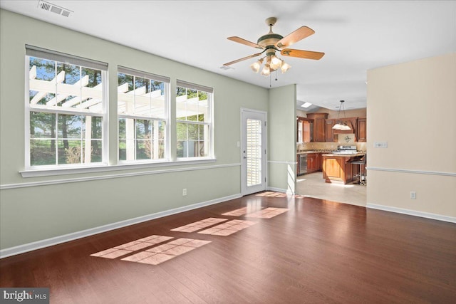 5 Klockner Ct, Lawrence Township, NJ 08648 - unfurnished living room with visible vents, light wood-style flooring, a ceiling fan, and baseboards