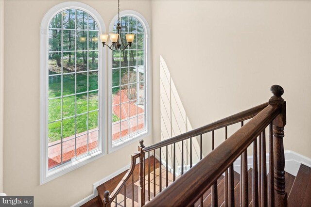 5 Klockner Ct, Lawrence Township, NJ 08648 - interior space with wood finished floors, an inviting chandelier, and baseboards