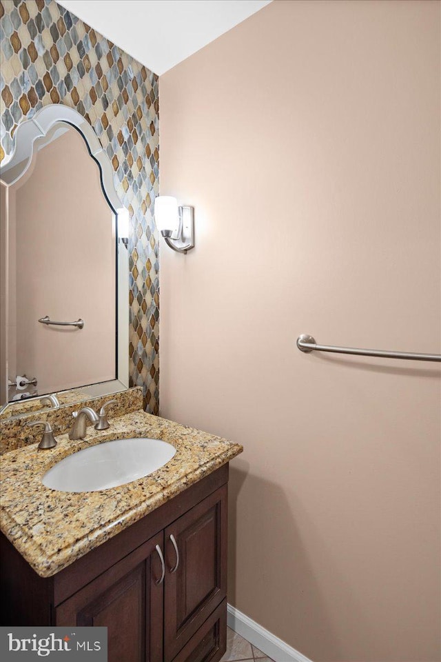 5 Klockner Ct, Lawrence Township, NJ 08648 - bathroom with baseboards, vanity, and wallpapered walls