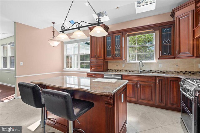 5 Klockner Ct, Lawrence Township, NJ 08648 - kitchen with appliances with stainless steel finishes, a sink, backsplash, and light stone counters