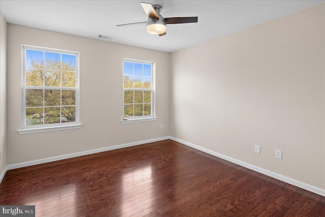 5 Klockner Ct, Lawrence Township, NJ 08648 - unfurnished room featuring dark wood-type flooring, visible vents, baseboards, and ceiling fan