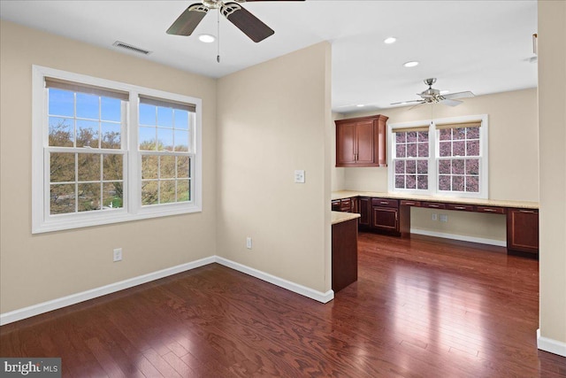 5 Klockner Ct, Lawrence Township, NJ 08648 - interior space with visible vents, baseboards, built in desk, ceiling fan, and dark wood-style floors