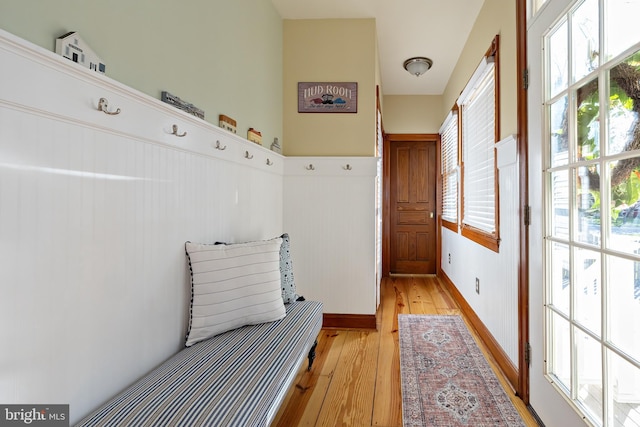 mudroom with light wood finished floors