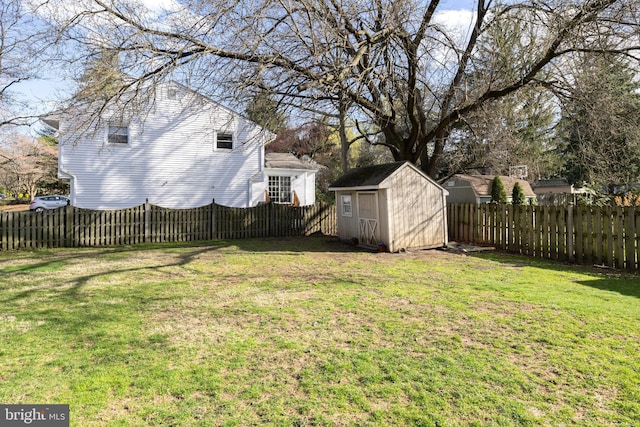 view of yard with a shed and an outdoor structure