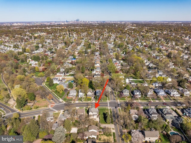 aerial overview of property's location with nearby suburban area