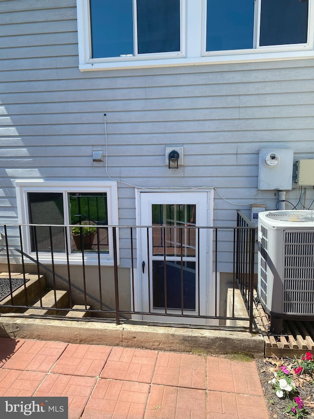 entrance to property with central air condition unit