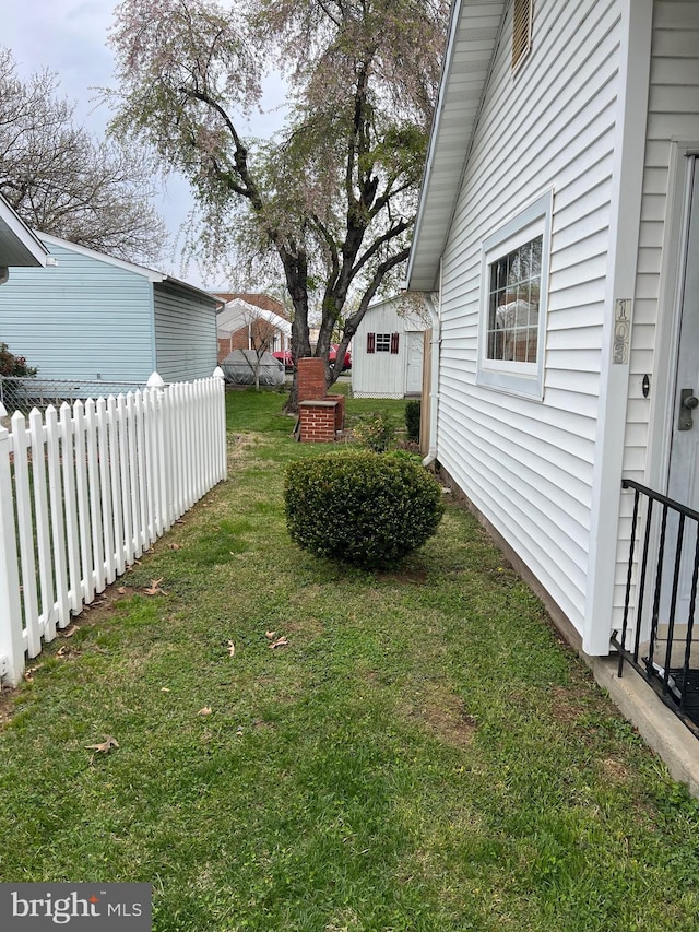 view of yard featuring fence