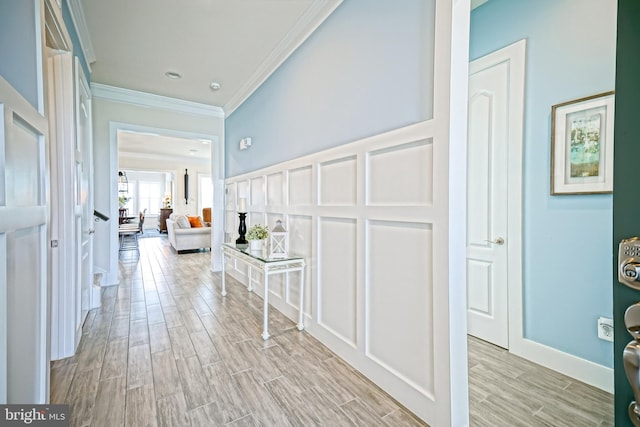19140 Chartres St, Lewes, DE 19958 - hall with crown molding, wood finished floors, and baseboards