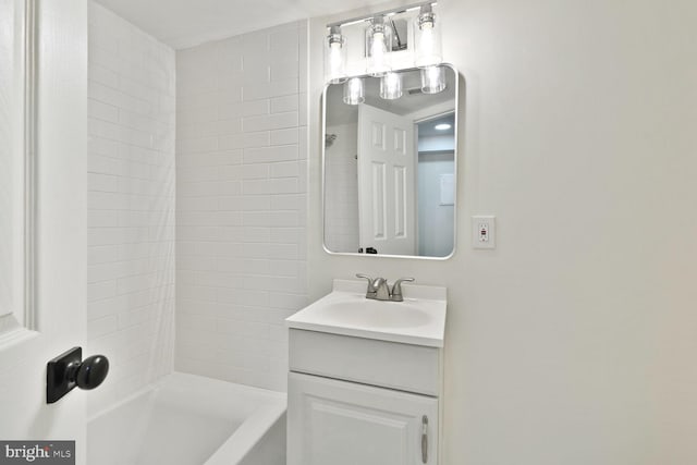bathroom with shower / bath combination and vanity