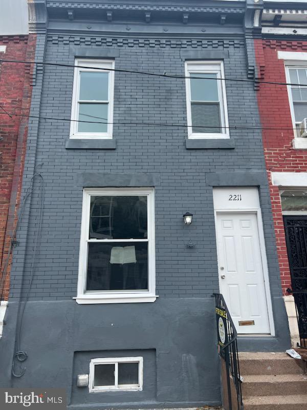 2211 Pierce St, Philadelphia, PA 19145 - view of front facade with brick siding