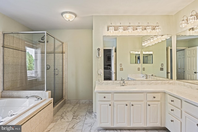 815 Kenneth Pl SE, Leesburg, VA 20175 - full bathroom featuring vanity, a garden tub, a shower stall, and marble finish floor