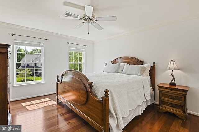815 Kenneth Pl SE, Leesburg, VA 20175 - bedroom featuring baseboards, crown molding, visible vents, and dark wood-style floors