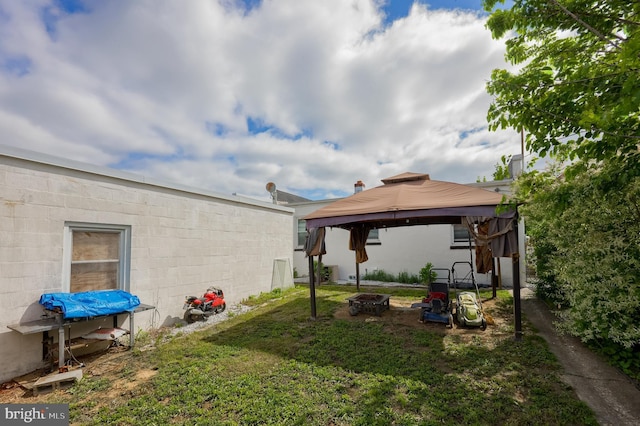 326 Frederick Ct, York, PA 17406 - view of grassy yard featuring a gazebo and a fire pit