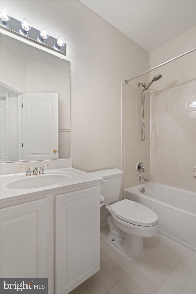 full bath featuring shower / bathtub combination, tile patterned flooring, vanity, and toilet