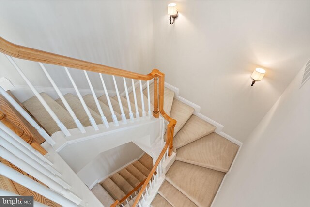 stairs with baseboards