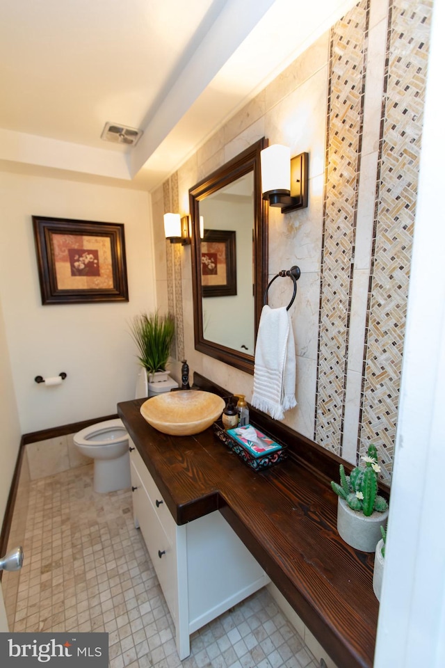 13909 Broomall Ln, Silver Spring, MD 20906 - bathroom with vanity, tile patterned flooring, toilet, and visible vents