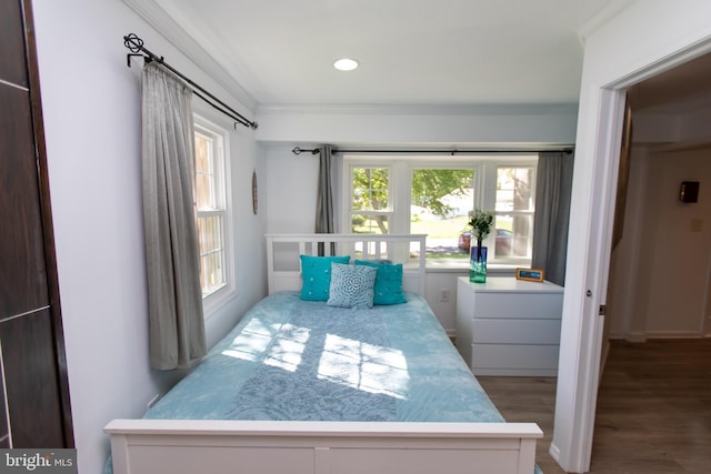 13909 Broomall Ln, Silver Spring, MD 20906 - bedroom with crown molding, wood finished floors, and multiple windows