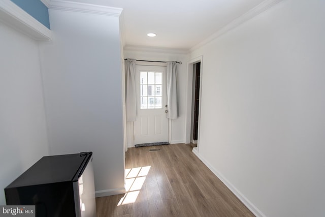 13909 Broomall Ln, Silver Spring, MD 20906 - interior space featuring recessed lighting, baseboards, wood finished floors, visible vents, and ornamental molding