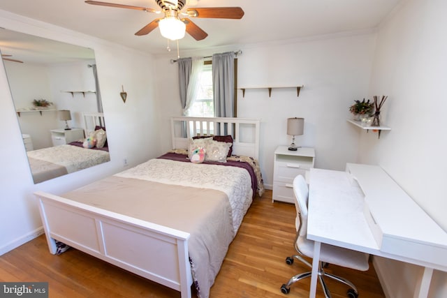 13909 Broomall Ln, Silver Spring, MD 20906 - bedroom featuring a ceiling fan, ornamental molding, and light wood-type flooring