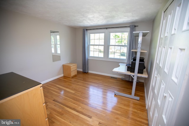 13909 Broomall Ln, Silver Spring, MD 20906 - unfurnished bedroom featuring baseboards, visible vents, multiple windows, and light wood-style floors