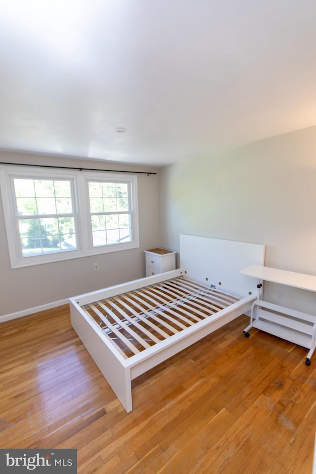 13909 Broomall Ln, Silver Spring, MD 20906 - bedroom featuring light wood-style floors and baseboards