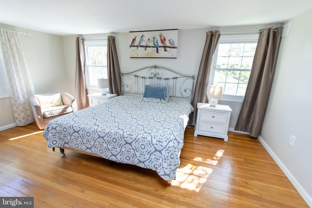 13909 Broomall Ln, Silver Spring, MD 20906 - bedroom featuring light wood-style floors and baseboards