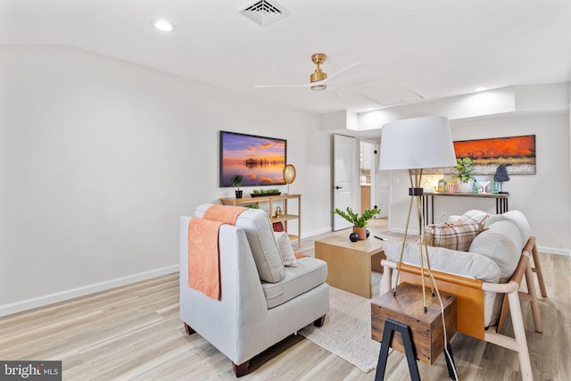 living area with recessed lighting, light wood finished floors, visible vents, a ceiling fan, and baseboards