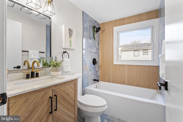 full bath featuring shower / washtub combination, vanity, and toilet