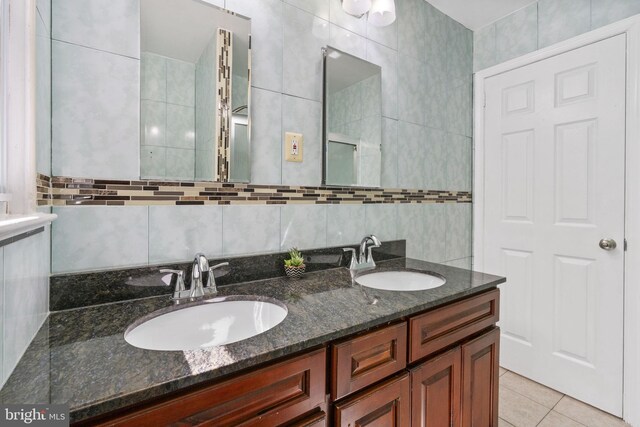 1302 Ashbridge Rd, West Chester, PA 19380 - full bathroom featuring tile patterned flooring, tile walls, and double vanity