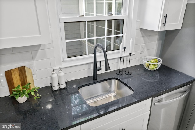 1302 Ashbridge Rd, West Chester, PA 19380 - kitchen with stainless steel dishwasher, tasteful backsplash, a sink, and white cabinets