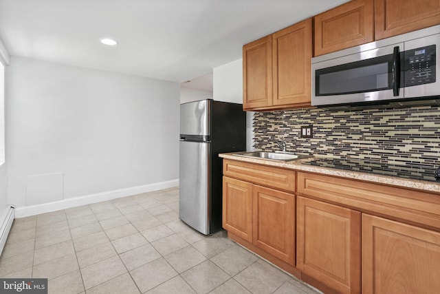 1302 Ashbridge Rd, West Chester, PA 19380 - kitchen featuring stainless steel appliances, a sink, backsplash, baseboards, and light tile patterned floors