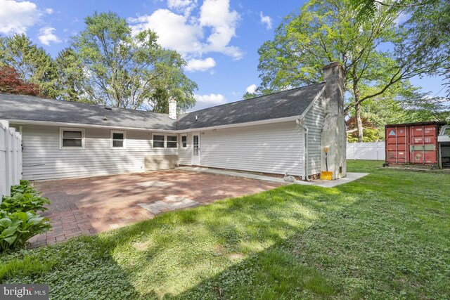 1302 Ashbridge Rd, West Chester, PA 19380 - back of property with a chimney and a patio area