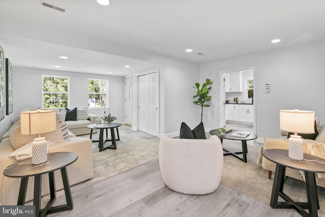 1302 Ashbridge Rd, West Chester, PA 19380 - living area featuring light wood-type flooring, recessed lighting, and baseboards