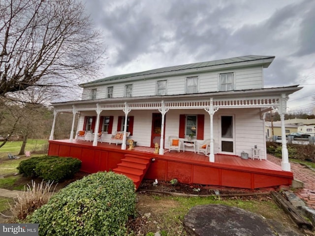 back of house with covered porch