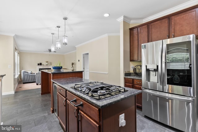 7027 Sand Cherry Way, Clinton, MD 20735 - kitchen featuring stainless steel fridge with ice dispenser, black gas stovetop, crown molding, a kitchen island, and open floor plan