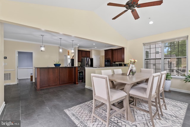 7027 Sand Cherry Way, Clinton, MD 20735 - dining room featuring baseboards, a ceiling fan, vaulted ceiling, ornamental molding, and recessed lighting