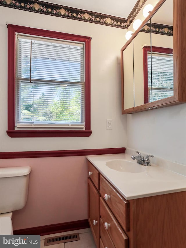 4216 Valley Vista Ct, Manchester, MD 21102 - bathroom featuring vanity, toilet, and visible vents