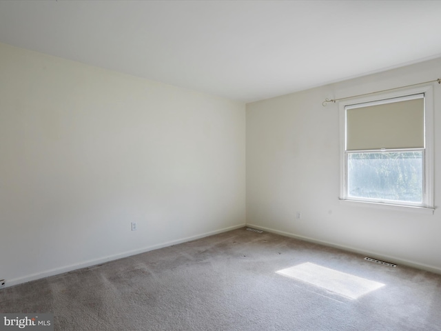 4216 Valley Vista Ct, Manchester, MD 21102 - unfurnished room featuring baseboards, visible vents, and carpet