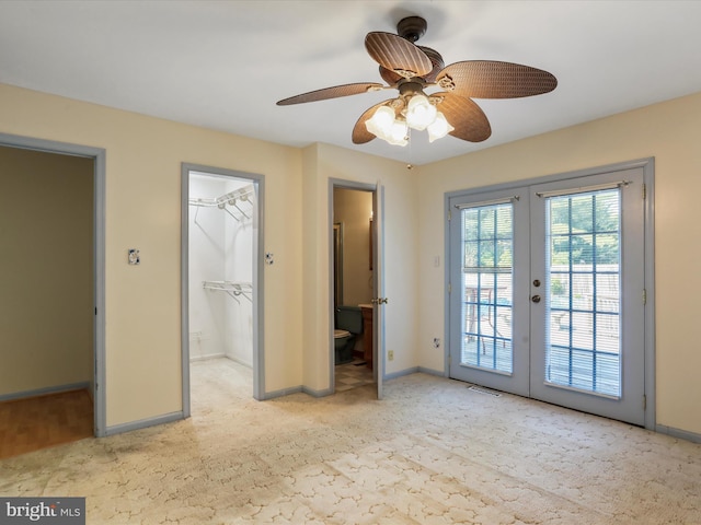 4216 Valley Vista Ct, Manchester, MD 21102 - unfurnished bedroom featuring carpet floors, visible vents, access to exterior, a walk in closet, and french doors