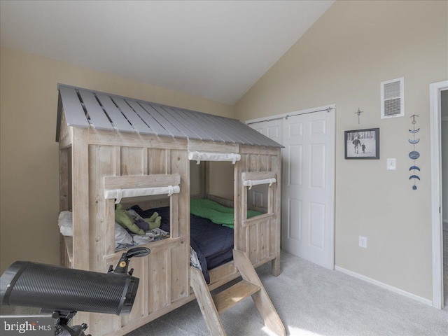 bedroom featuring carpet flooring, visible vents, baseboards, and vaulted ceiling