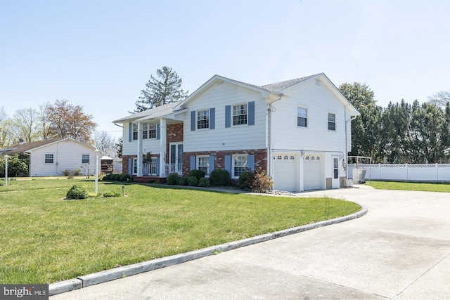 1713 Marla Pl, Vineland, NJ 08361 - view of front of home featuring fence, a front lawn, brick siding, a garage, and concrete driveway