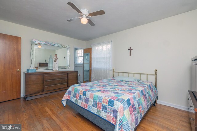 1713 Marla Pl, Vineland, NJ 08361 - bedroom with baseboards, a ceiling fan, and wood finished floors