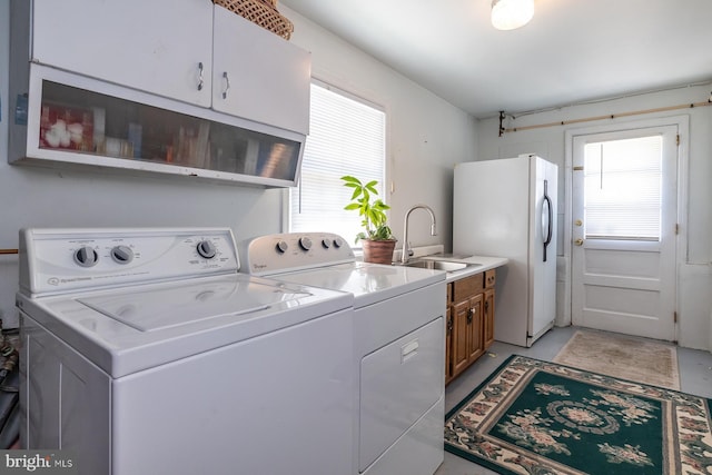 1713 Marla Pl, Vineland, NJ 08361 - washroom with a sink, cabinet space, and separate washer and dryer