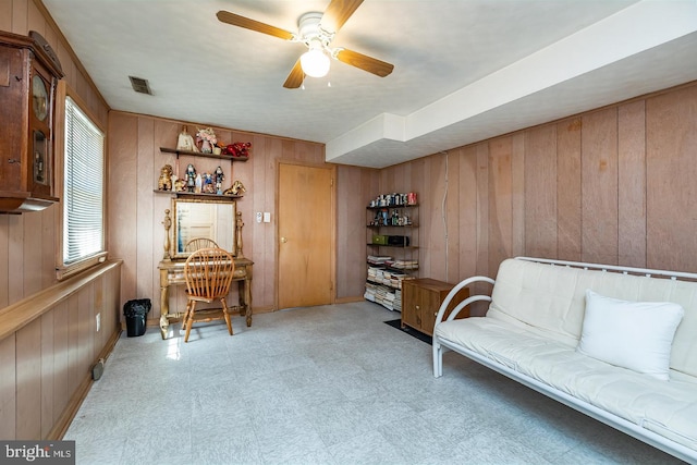 1713 Marla Pl, Vineland, NJ 08361 - sitting room featuring wooden walls, visible vents, a ceiling fan, and light floors