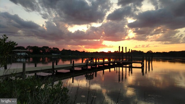 view of dock with a water view