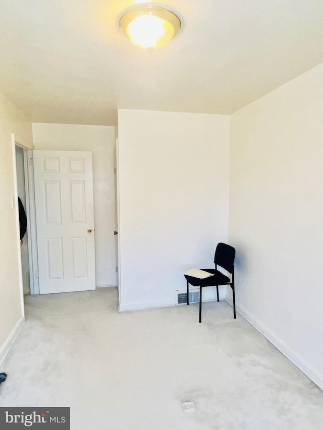 interior space with visible vents and baseboards