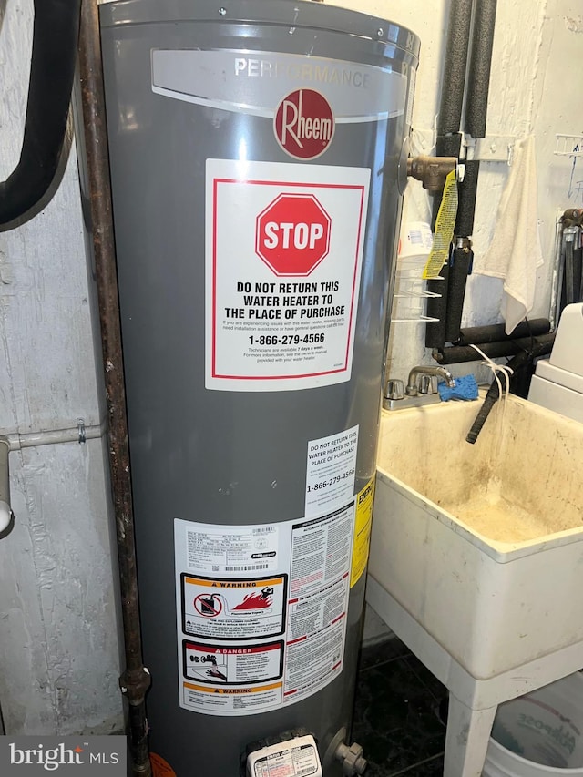 utilities featuring a sink and water heater